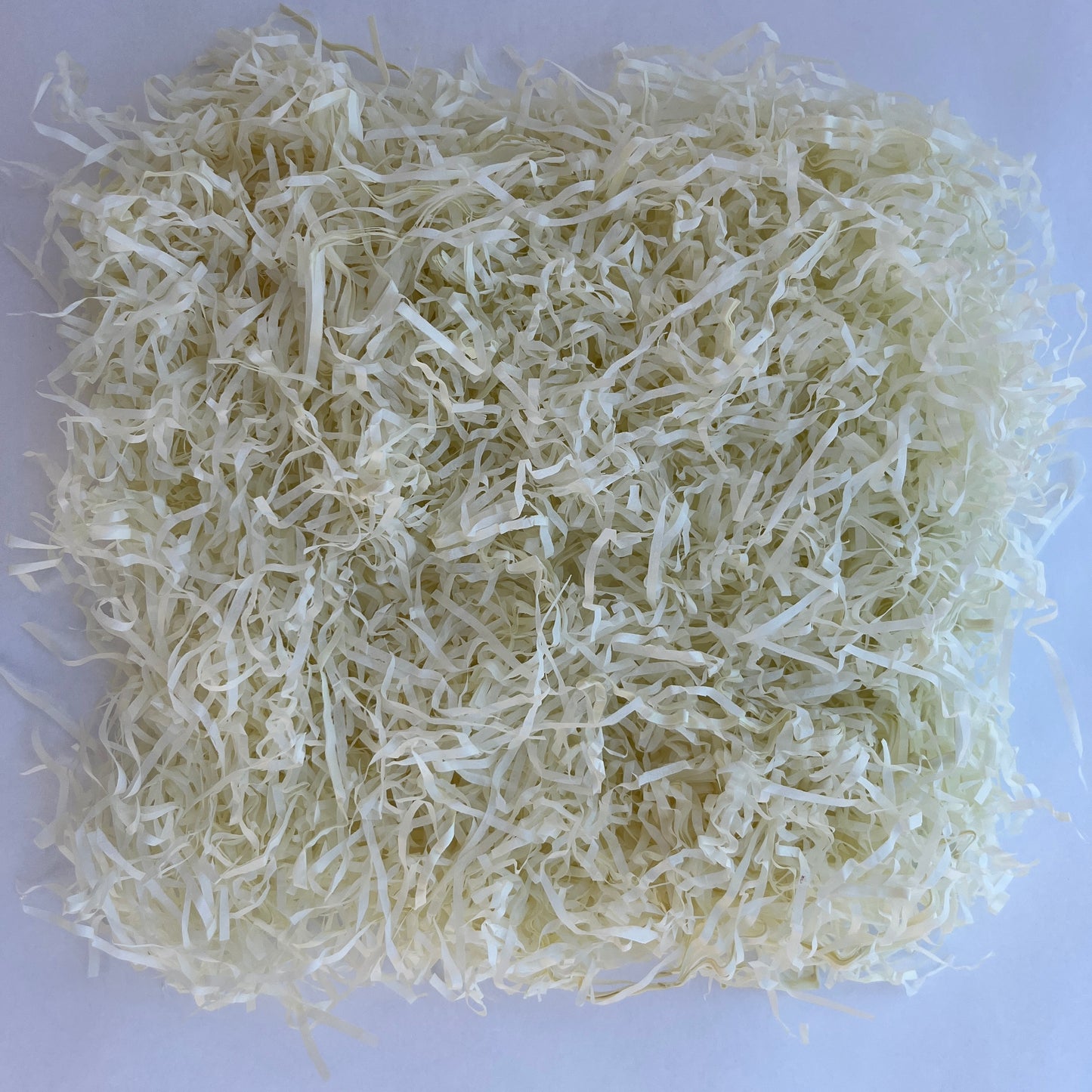 Cream shredded paper filler 25g eco friendly recycled packaging fill