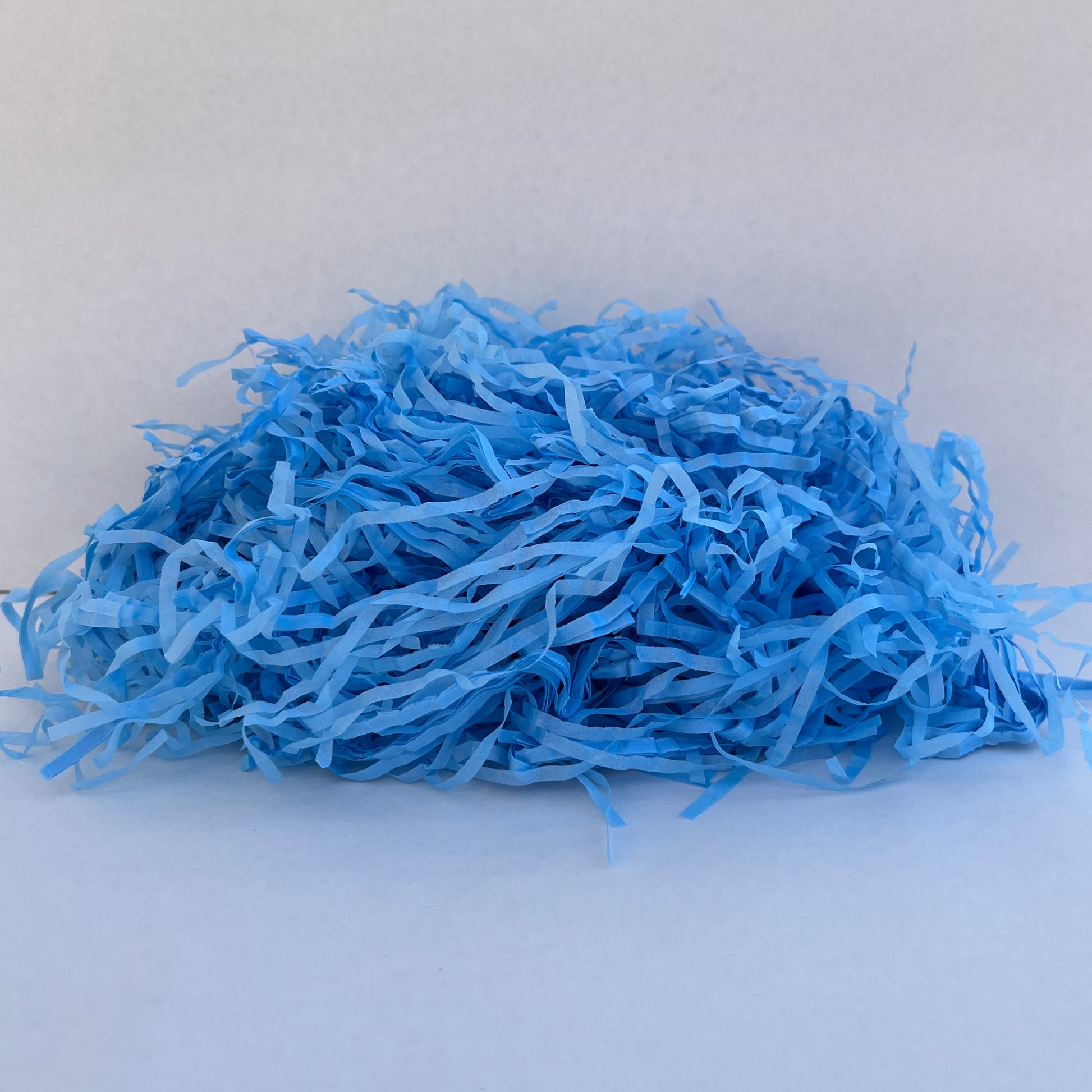 Blue paper shred hamper filler eco friendly packaging material