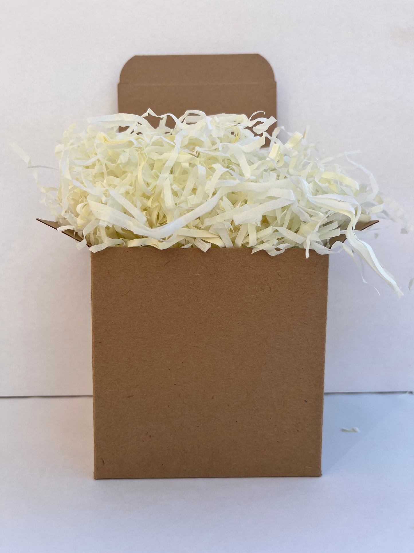 Cream shredded paper in gift box packaging eco friendly filler