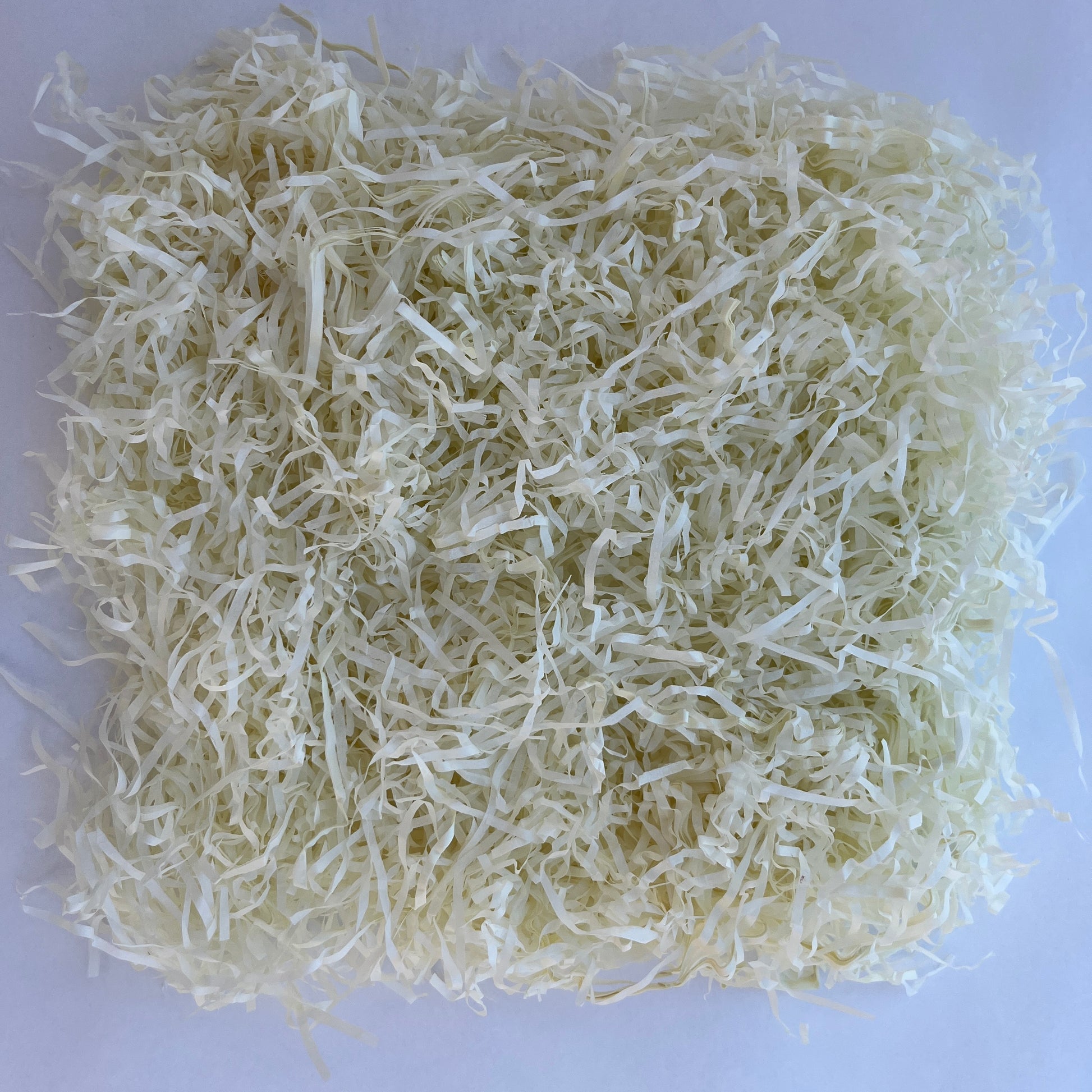 Cream shredded paper filler 25g eco friendly recycled packaging fill