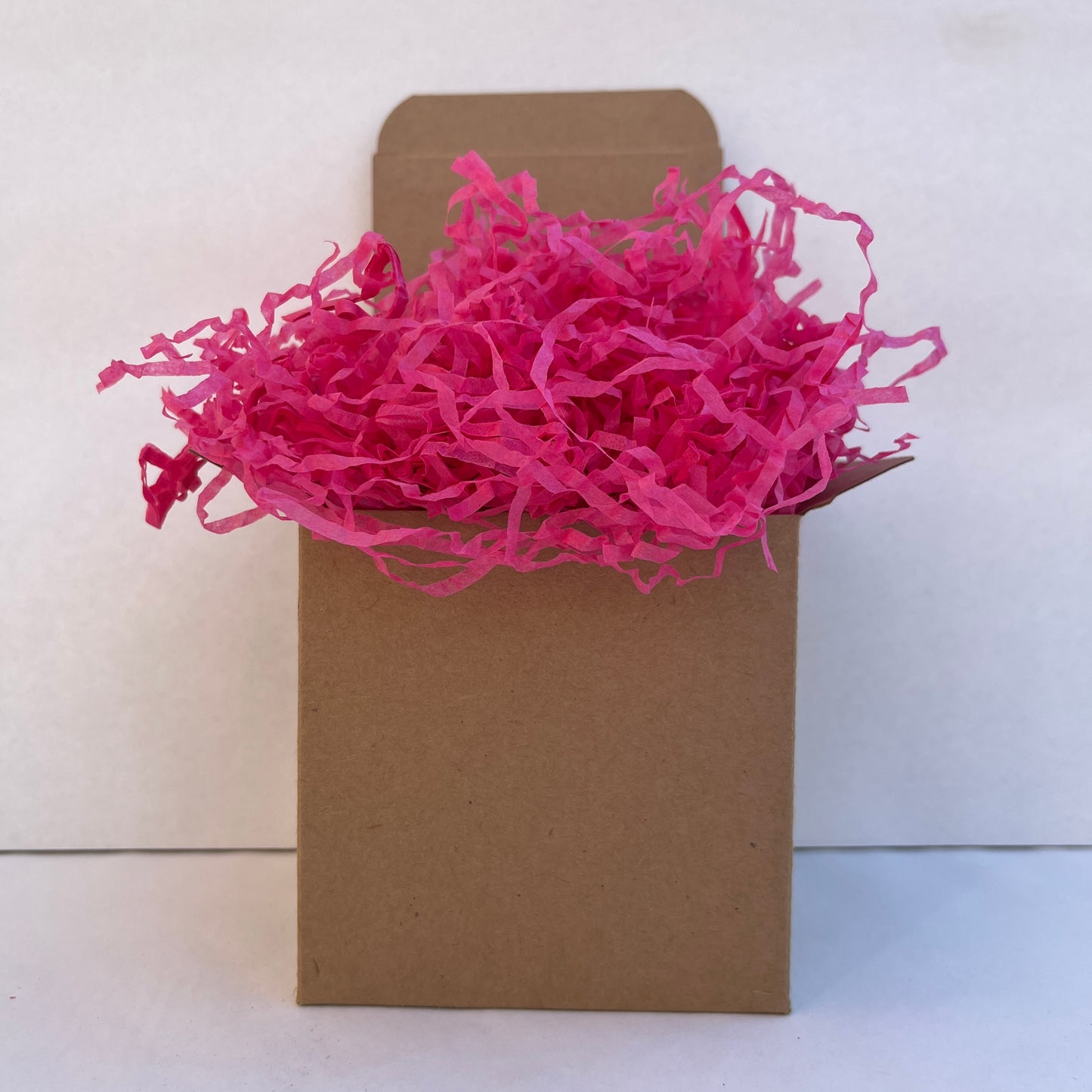Hot Pink shredded paper in gift box packaging eco friendly filler