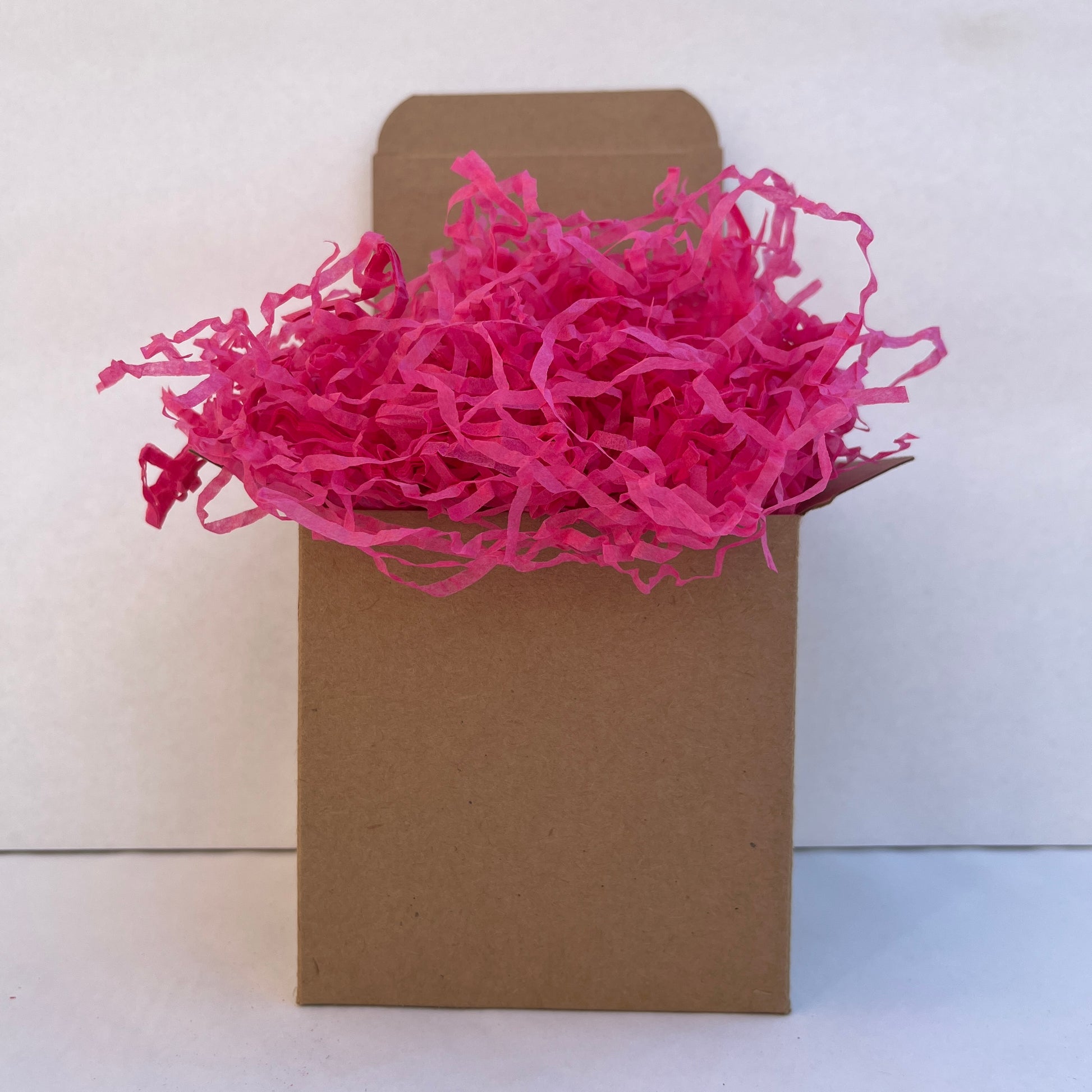 Hot Pink shredded paper in gift box packaging eco friendly filler