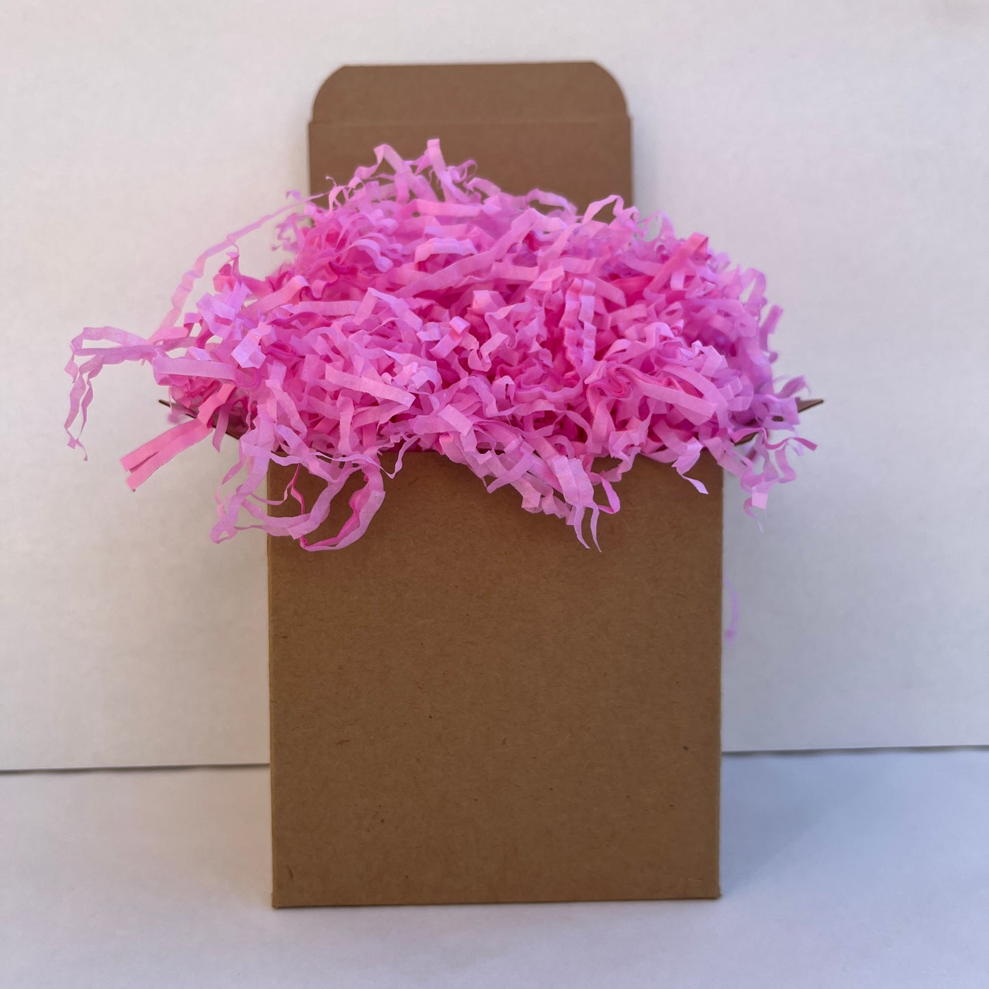 Pale Pink shredded paper in gift box packaging eco friendly filler