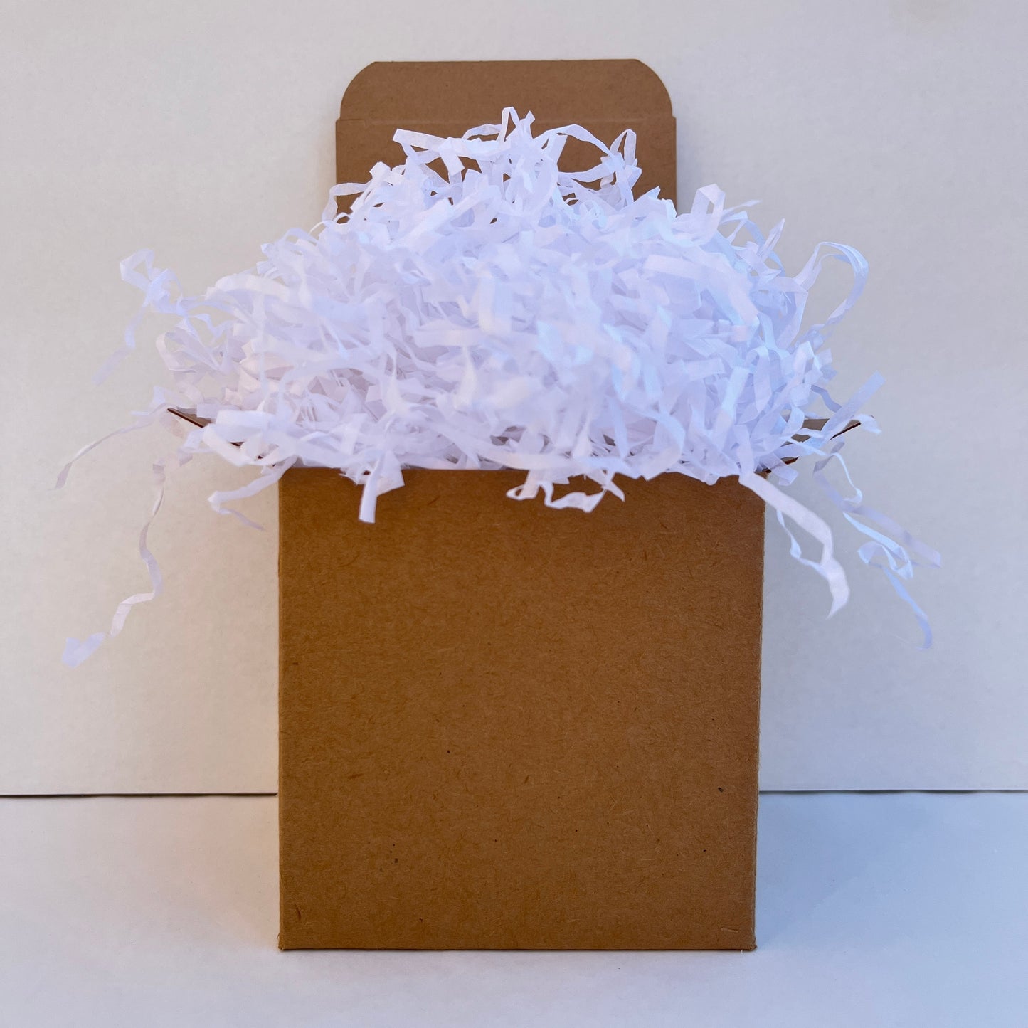 White shredded paper in gift box packaging eco friendly filler