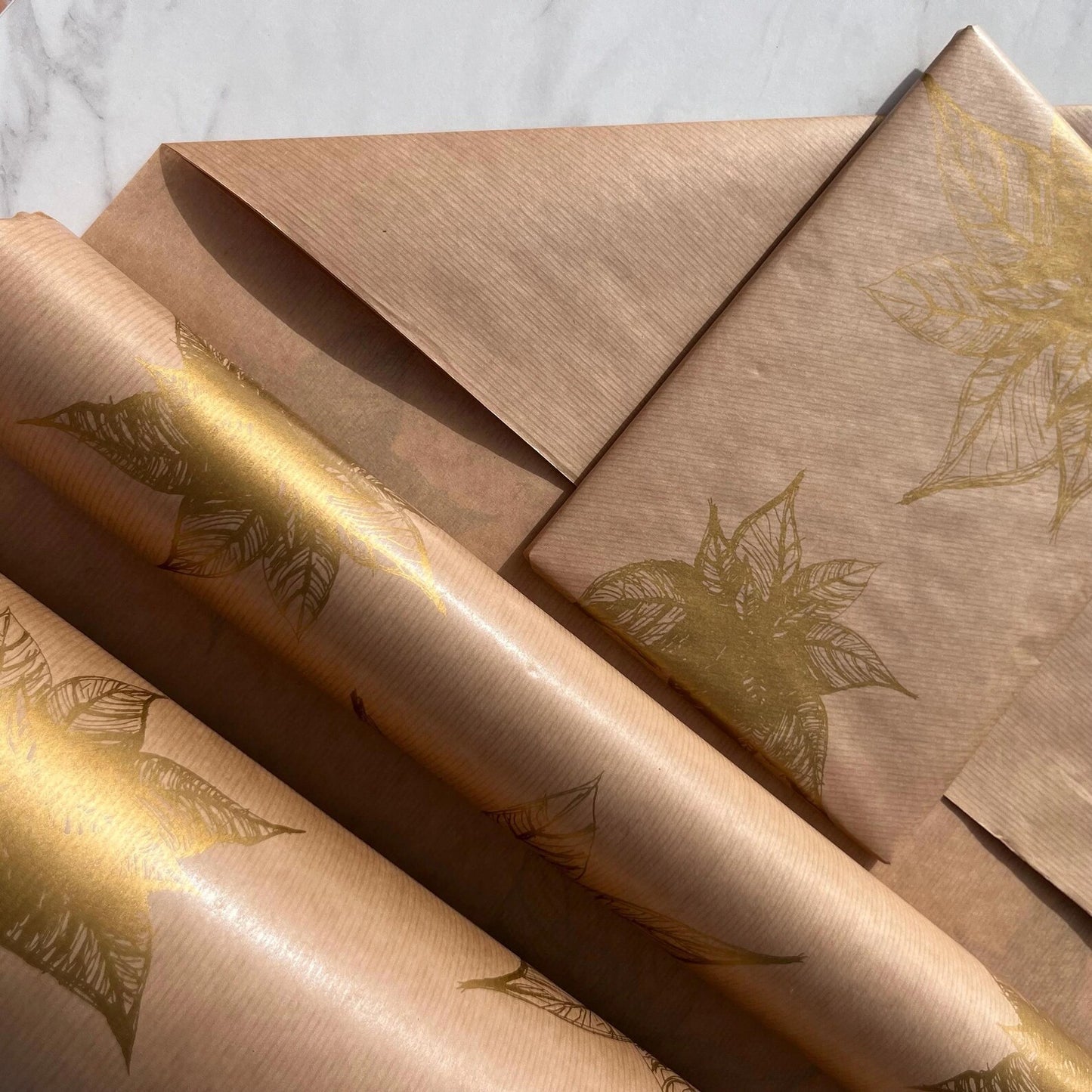Christmas Wrapping Paper Gold Poinsettia 50CM Wide Eco Friendly, 100% Recycled Kraft | Recyclable, Sustainable, Plastic Free Gift Wrap